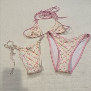 Pink and Cream Bikini Set New without tags.  1 top and 2 bottoms.  All size Xs